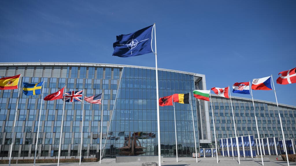 Europe's top NATO powers pledge greater defence role while reaffirming US alliance